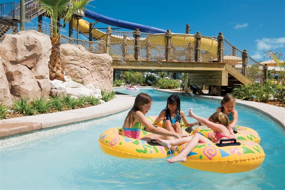 Four girls playing in a lazy river