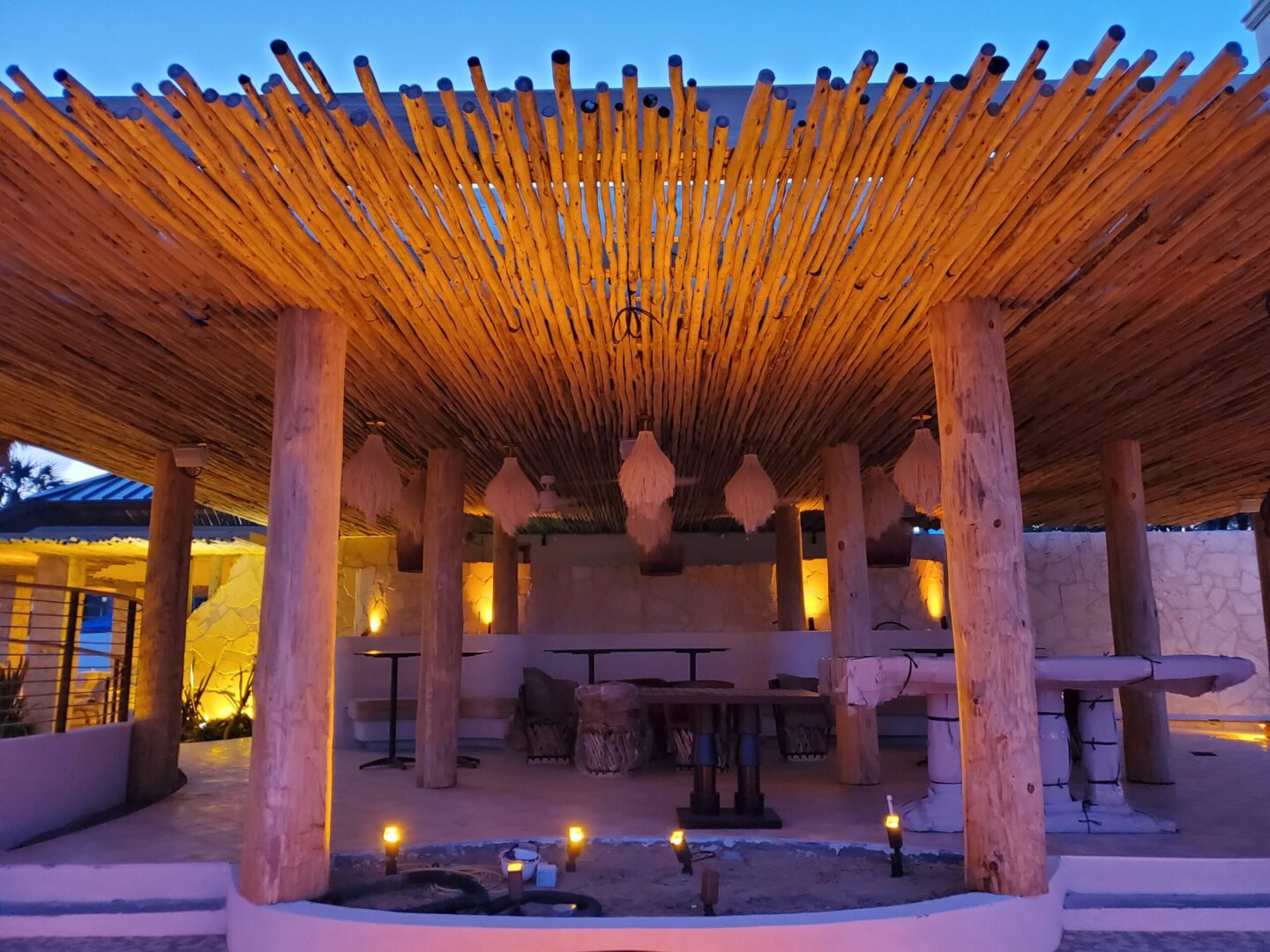 A tiki hut with candles
