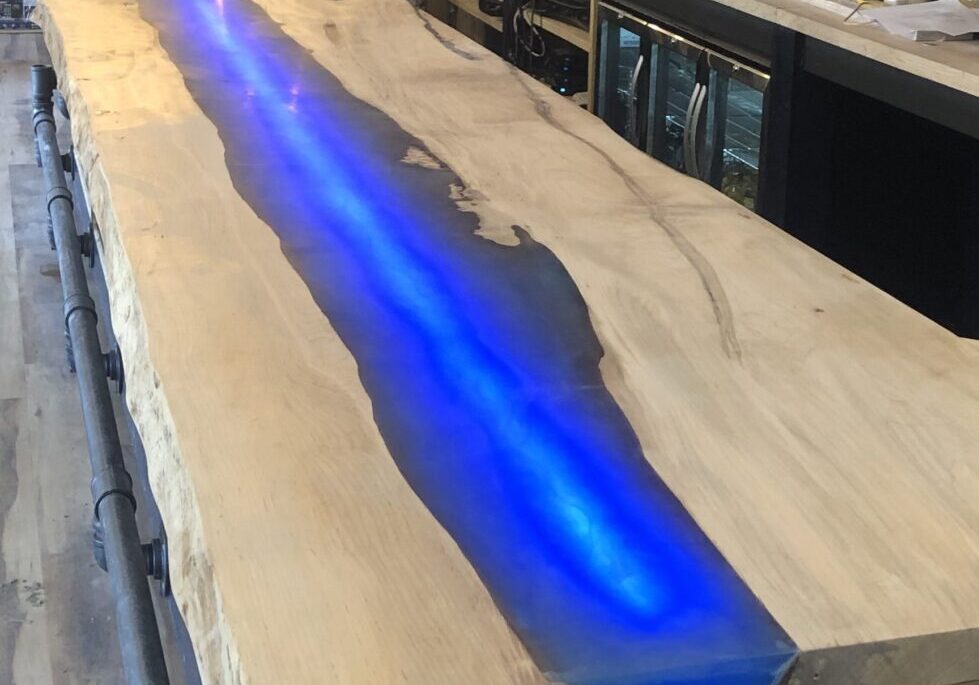 A bar with a blue light on it.